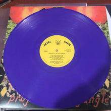 Cargar imagen en el visor de la galería, Blue vinyl record with a yellow label on top of a colorful album cover.