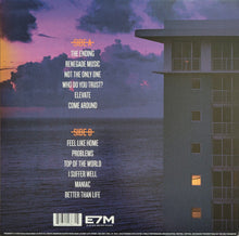 Cargar imagen en el visor de la galería, Album cover with text list and building silhouette against a sunset sky