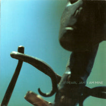 Load image into Gallery viewer, Album cover for Pearl Jam's 'I Am Mine' with a close-up of a metal object.