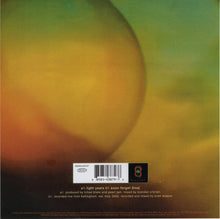 Cargar imagen en el visor de la galería, Album cover with a large orange circle on a green and brown gradient background