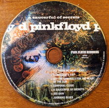 Charger l'image dans la galerie, Pink Floyd record with artwork and tracklist on a wooden surface