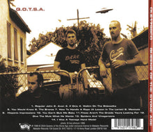 Load image into Gallery viewer, Album cover with three men standing behind a chain-link fence, featuring text and a barcode on the right.