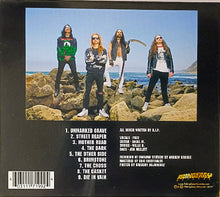 Cargar imagen en el visor de la galería, Back cover of a music album with band members on rocks by the ocean and track list.