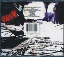 Cargar imagen en el visor de la galería, Radiohead - Kid A back compact disc.