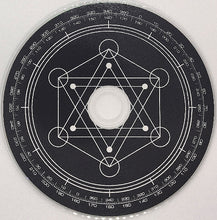 Load image into Gallery viewer, Circular object with geometric design and measurement markings on a black background