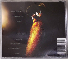 Cargar imagen en el visor de la galería, CD case with artistic design and text on a dark background