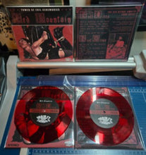 Load image into Gallery viewer, Red vinyl records with matching sleeve on a blue surface