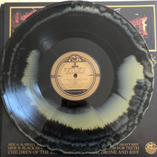 Load image into Gallery viewer, Vinyl record with a unique black and white pattern on the cover