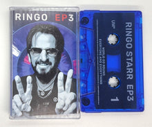 Load image into Gallery viewer, Cover art for Ringo EP3 cassette featuring a colorful illustration of Ringo Starr with two fingers raised in a peace sign against a starry background.