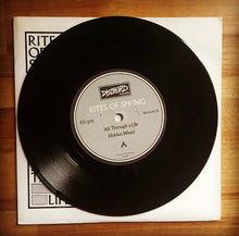 Load image into Gallery viewer, Vinyl record with 'Rites of Spring' on a wooden surface