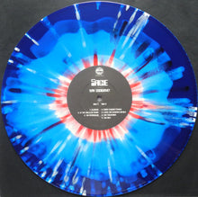Cargar imagen en el visor de la galería, Vinyl record with blue and red abstract design on a black background