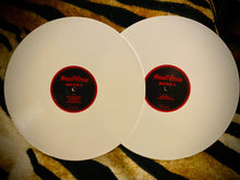Charger l&#39;image dans la galerie, Two white vinyl records with red labels on a zebra-patterned surface