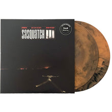 Cargar imagen en el visor de la galería, Vinyl record with a dark cover and orange-brown disc, featuring 'Sasquatch' branding.