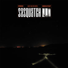 Load image into Gallery viewer, Cover art for Sasquatch - III vinyl record featuring a dark outdoor scene with a mysterious object in the distance.
