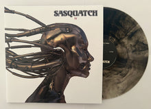 Cargar imagen en el visor de la galería, Album cover art for Sasquatch IV featuring a stylized illustration of a metallic, robotic-like figure with a human head.