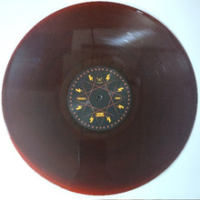 Cargar imagen en el visor de la galería, Vinyl record with a label on a white background