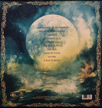 Cargar imagen en el visor de la galería, Album cover with celestial design, moon, and poetic text on a dark blue background.