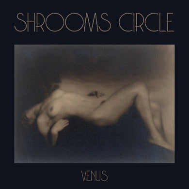 Album cover for 'Shrooms Circle Venus' with a black and white image of a person.