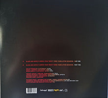 Charger l'image dans la galerie, Back cover of a vinyl record with text and logos on a black background