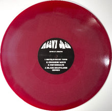 Cargar imagen en el visor de la galería, Red vinyl record with a black label on a white background