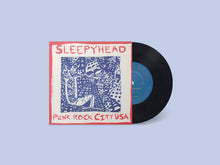 Charger l'image dans la galerie, Vinyl record with 'Sleepyhead' album cover on a light blue background