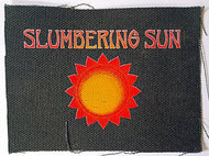Embroidered patch with 'Slumbering Sun' text and sun design on a black background