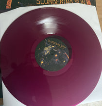 Cargar imagen en el visor de la galería, Purple vinyl record with a label on a white surface