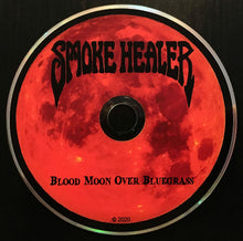 Cargar imagen en el visor de la galería, Compact disc with red moon design and &#39;Smoke Healer&#39; text
