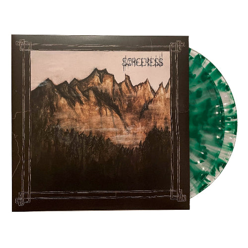 Vinyl record with mountain design cover and green marbled disc