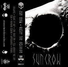 Cargar imagen en el visor de la galería, Black and white cassette tape cover featuring a circular motif with a skull in the center, surrounded by text and additional skull illustrations. The band's name 'Sun Crow' is prominently displayed at the bottom.