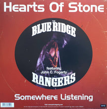 Charger l'image dans la galerie, Album cover for 'Somewhere Listening' by The Blue Ridge Rangers featuring John C. Fogerty on a red background.