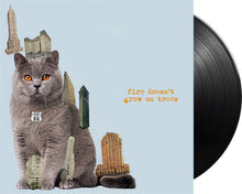 Charger l'image dans la galerie, Vinyl record with a cat and cityscape design on a light blue background