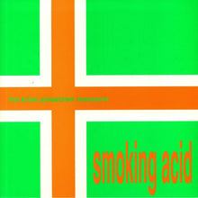Charger l'image dans la galerie, Album cover with green and orange cross and text 'the brian jenestown massacre' and 'smoking acid'.