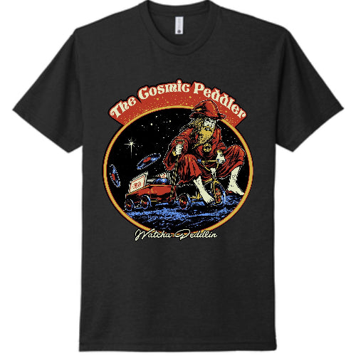 A black t-shirt with a graphic design featuring 'The Cosmic Peddler' text and an illustration of a character on a spaceship.