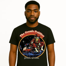 Charger l&#39;image dans la galerie, Person wearing a black t-shirt with &#39;The Cosmic Peddler&#39; graphic design.