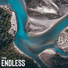 Load image into Gallery viewer, Aerial view of a river with turquoise water and surrounding landscape, with 'The Endless' text overlay.