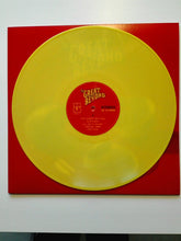 Cargar imagen en el visor de la galería, Yellow vinyl record with red label on a red background