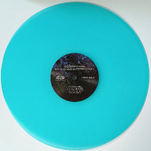 Load image into Gallery viewer, Vinyl record with a turquoise disc and black label on a white background