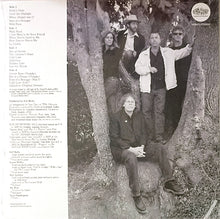 Load image into Gallery viewer, Album cover with a group of people in a forest setting, featuring a tree trunk and natural background.