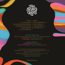 Cargar imagen en el visor de la galería, Album cover with colorful abstract designs and tracklist on a black background