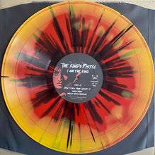 Load image into Gallery viewer, Vinyl record with a colorful splatter design on a blue background
