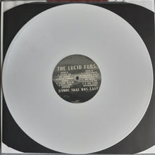 Charger l'image dans la galerie, Vinyl record with a white label featuring track listings and album name.