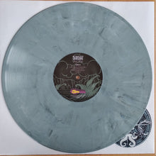 Charger l'image dans la galerie, Vinyl record with a label on a white background