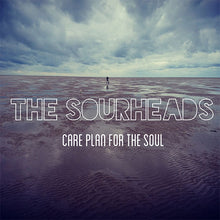 Charger l'image dans la galerie, Person walking on a beach with 'The Sourheads' album cover text overlay