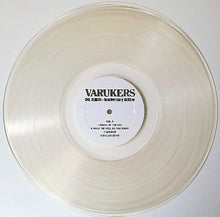 Cargar imagen en el visor de la galería, Vinyl record with a white label on a white background