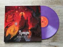 Cargar imagen en el visor de la galería, Vinyl record with a colorful cover on a wooden surface