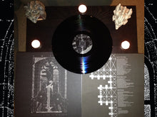 Load image into Gallery viewer, Vinyl record with a cover featuring text and graphics on a dark background