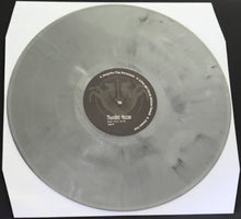 Charger l'image dans la galerie, Vinyl record with a label on a white background