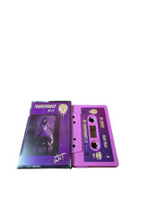 Cargar imagen en el visor de la galería, Purple cassette tape with a visible label on a white background