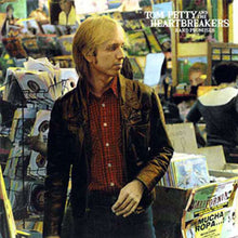Cargar imagen en el visor de la galería, Cover art for Tom Petty and The Heartbreakers album 'Hard Promises' featuring a photo of Tom Petty in a record store.